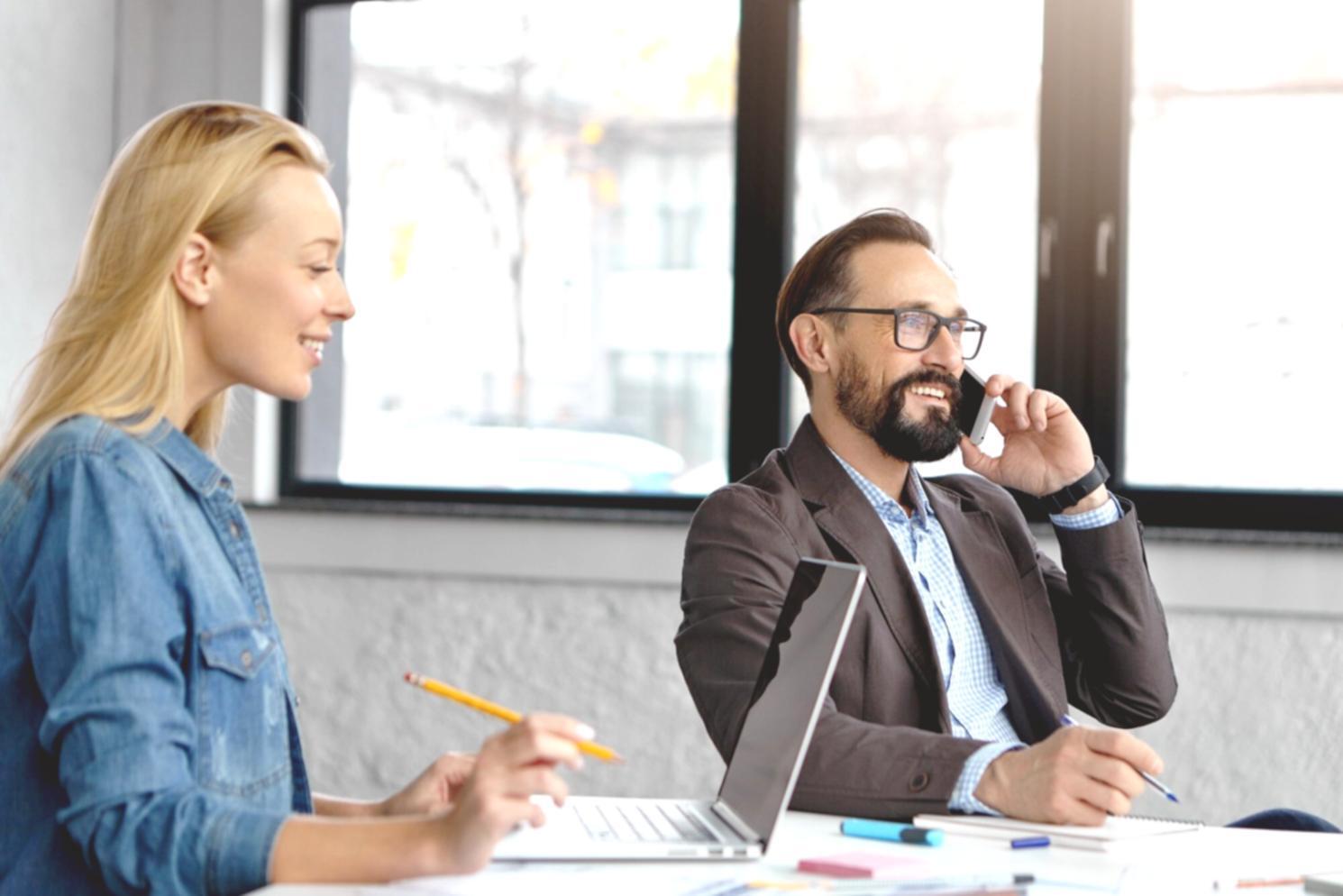 Students working collaboratively on financial analysis projects